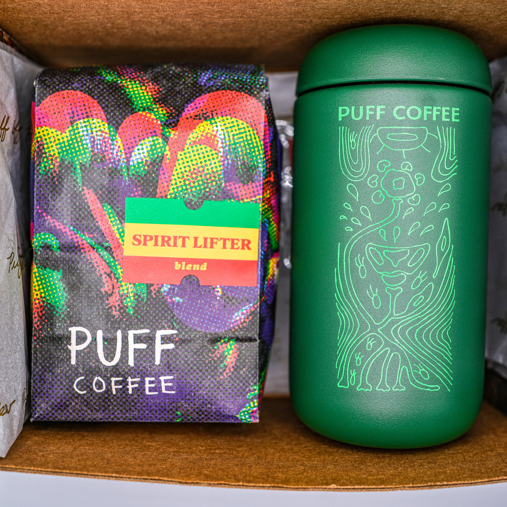 Puff Coffee Spirit Lifter in a gift box with a green thermos.