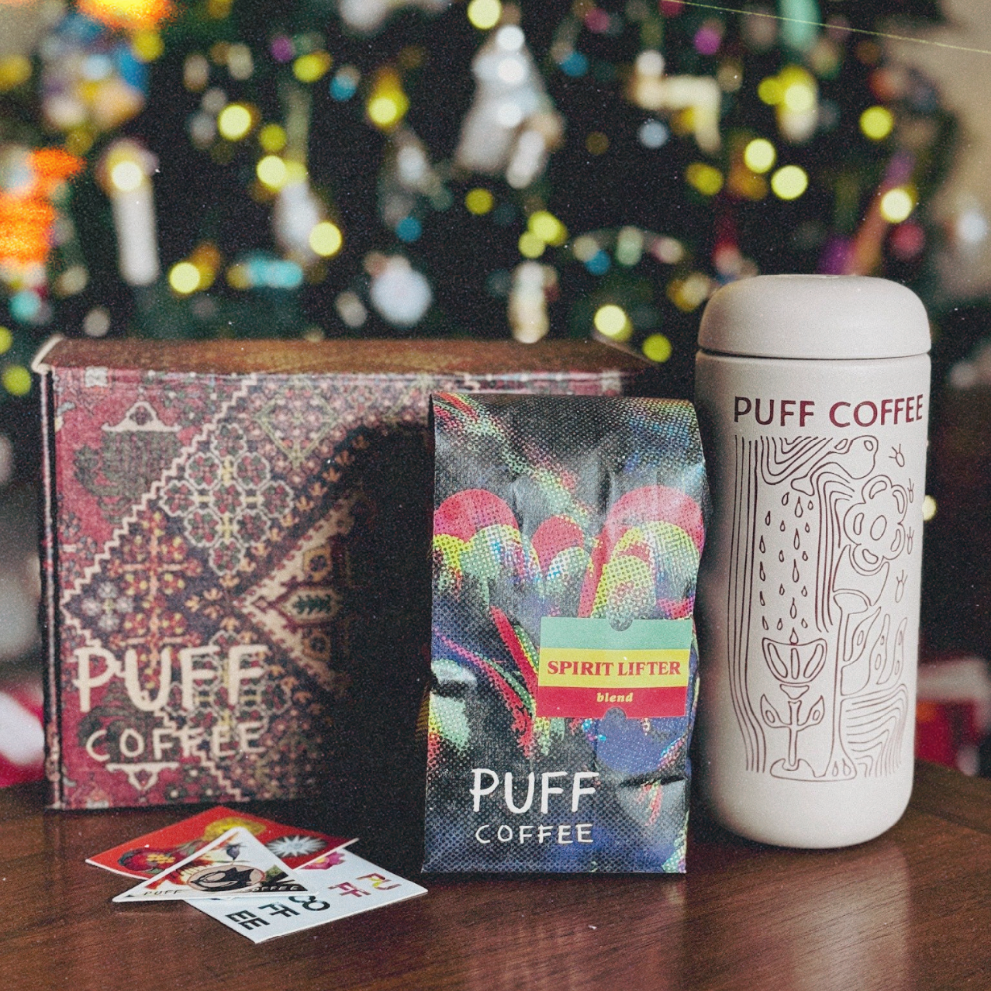 puff coffee gift box in front of festive tree